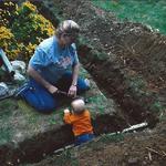 Mary Rice and Grandson, Hunter. Repairing an underground gas line. 